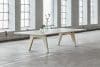 Sumo meeting table by Fredrik Mattson for Materia – wide-set legs, large format, integrated power sockets in top