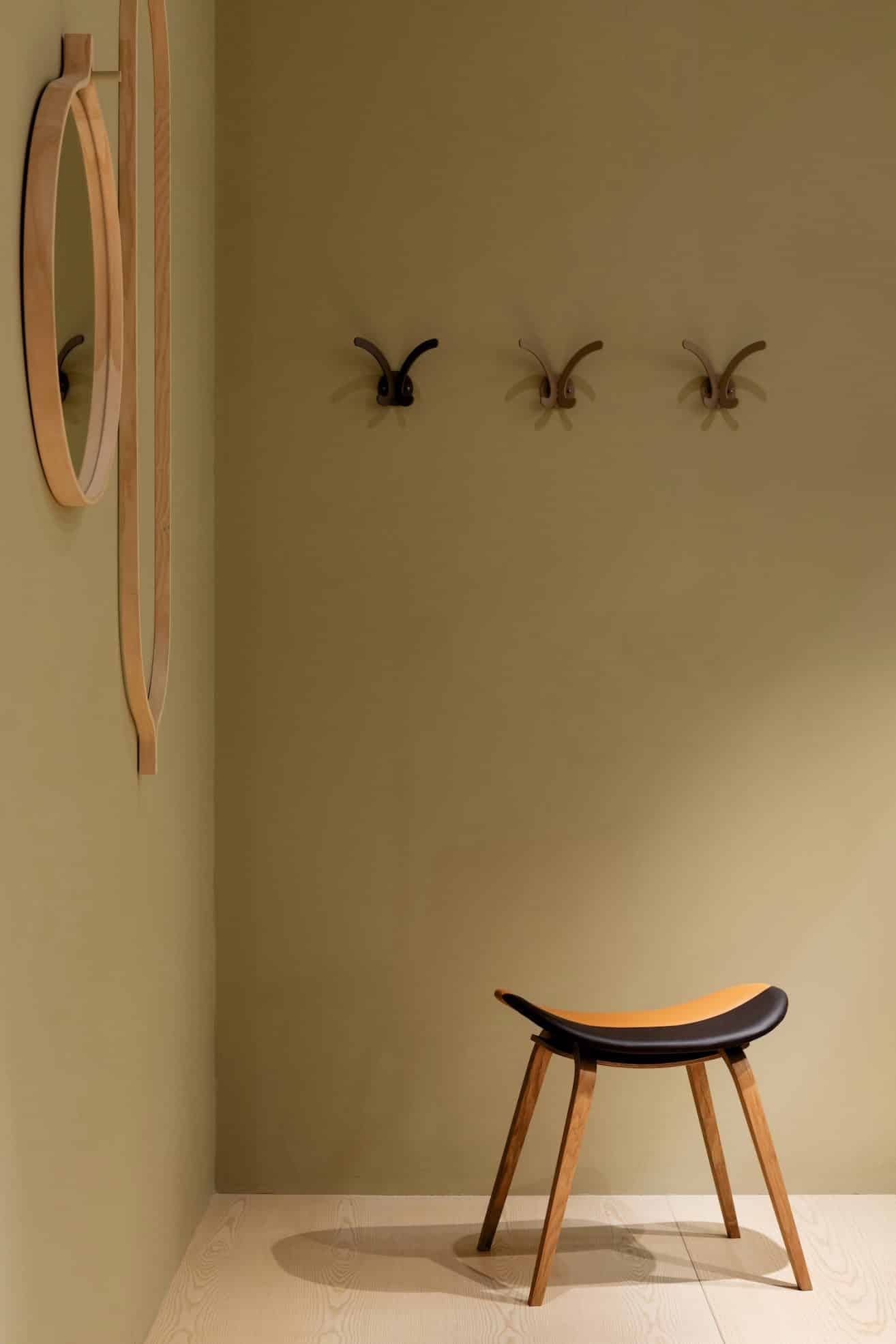 Stool by Thomas Sandell for Swedese — oak from Lamino off-cuts, seat upholstered in surplus leather with contrasting colours