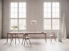 Expand dining table by Sami Kallio for Northern featuring solid oak construction and smooth extension system