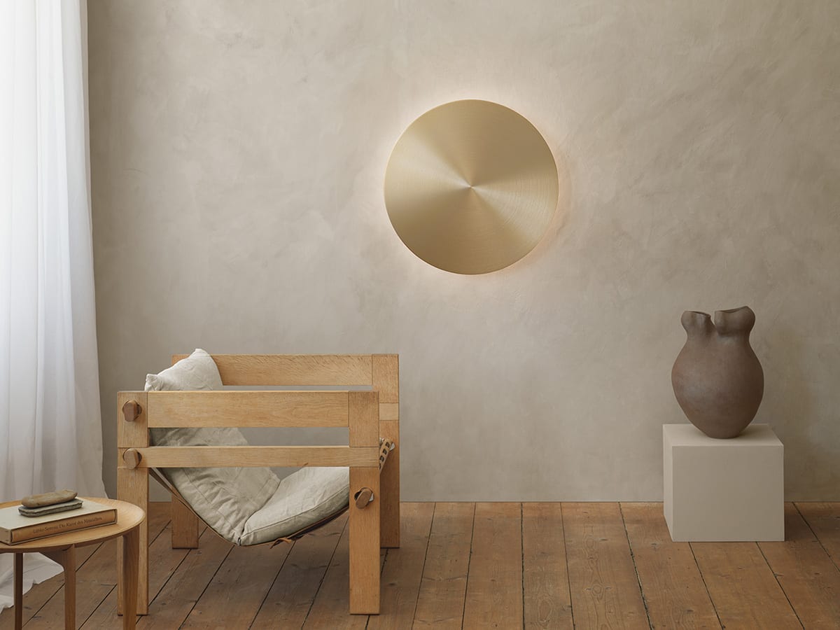 Alba wall light by Jordi Blasi for Atelje Lyktan featuring cymbal-inspired design and interactive control