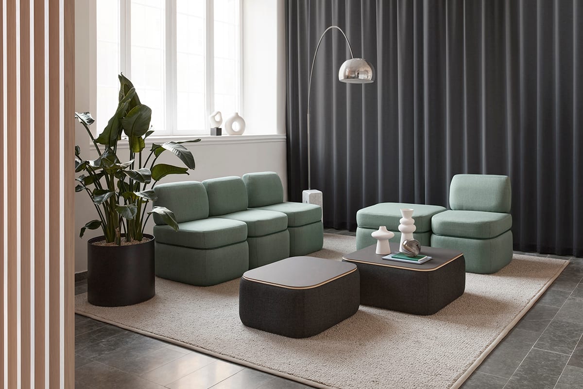 Charlie modular sofa system with signature metal ring by Färg & Blanche for Johanson Design