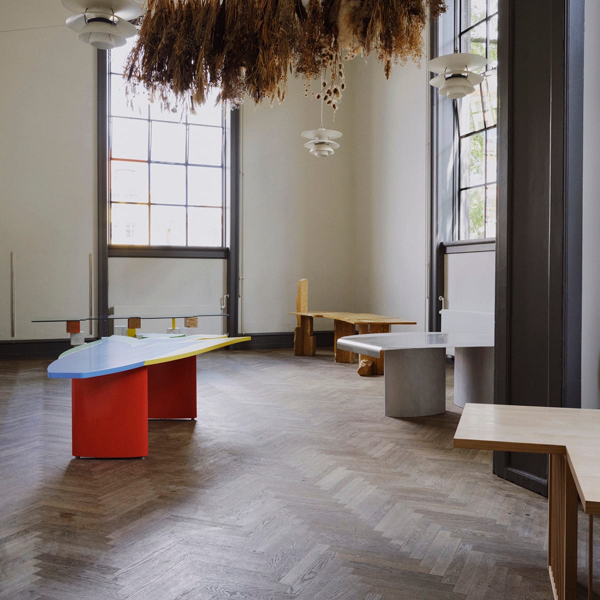 Studies of a Table exhibition overview featuring five unique table designs global designer collaboration