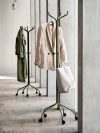 Roll mobile coat hanger by Louise Hederström featuring tree-inspired design with five wheels