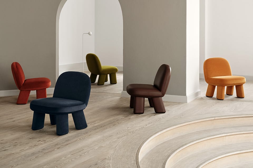 Transformed Maximus easy chair by Johan Ansander for Blå Station, evolving from all-wood construction to springy lushness.