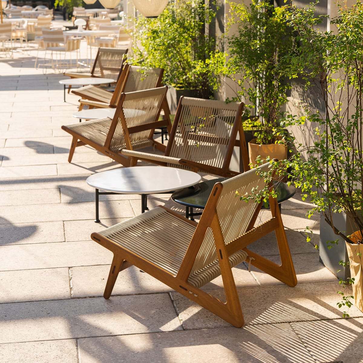 MR01 Initial Outdoor lounge chair featuring weather-resistant materials designed by Mathias Steen Rasmussen for GUBI