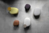 Cobble pouf collection featuring organic shapes in various sizes designed by Mattias Stenberg for Materia