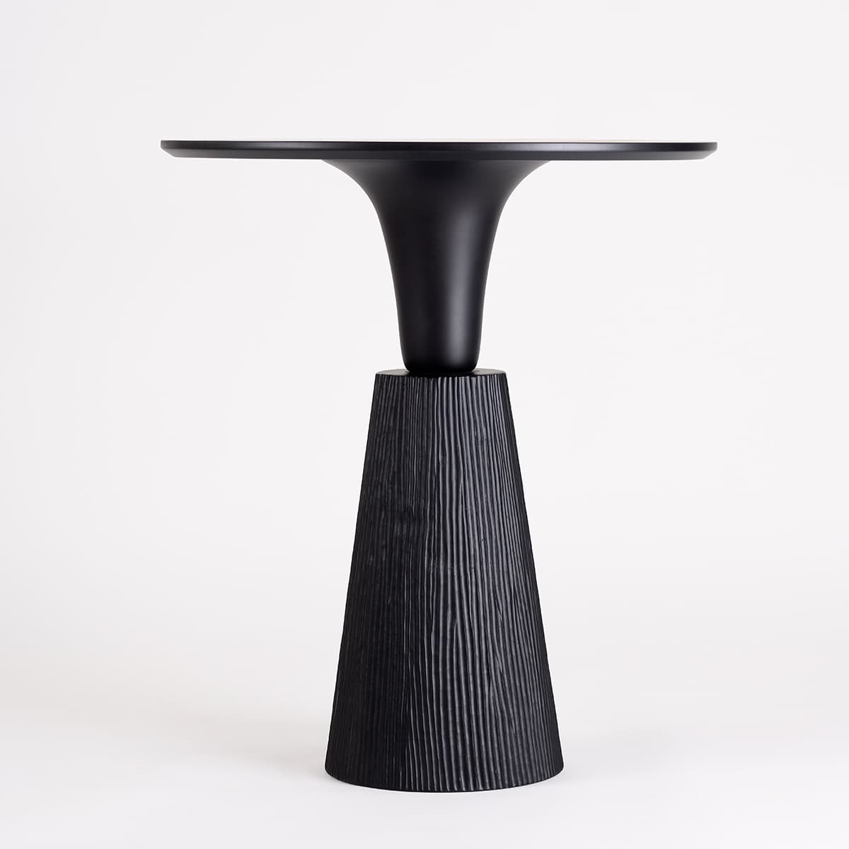 Pointe dining table featuring ballet-inspired tapered legs designed by Monica Förster for Zanat craftsmanship brand