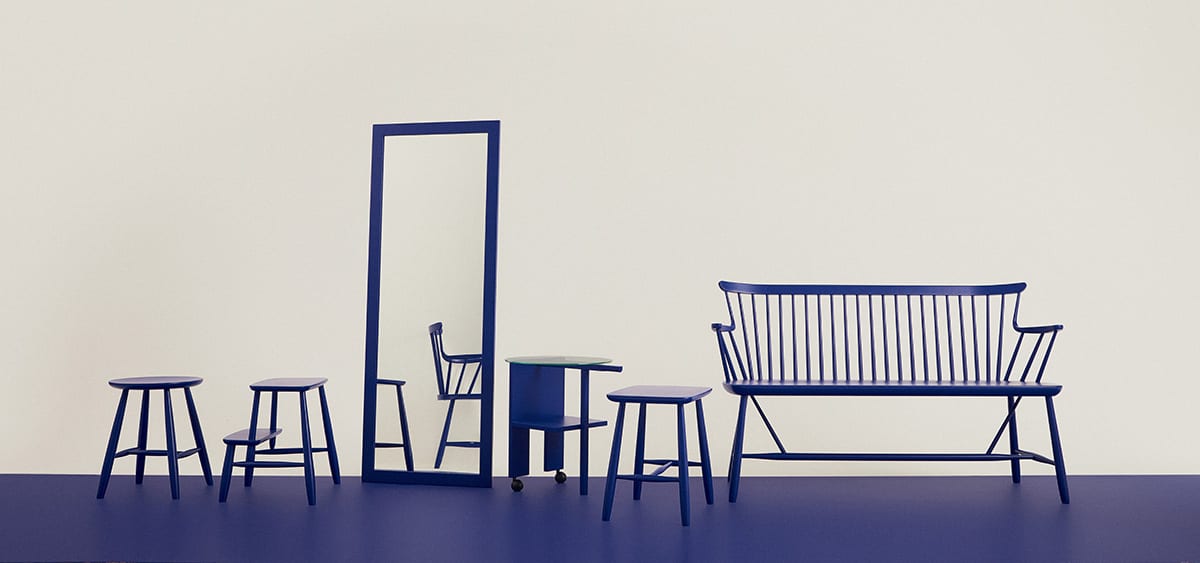 Complete Stora Blå furniture collection by Norrgavel displaying chairs, tables, and storage pieces