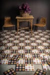 Dots tile series by Mats Theselius for Marrakech Design displaying various pattern and color combinations in an installation