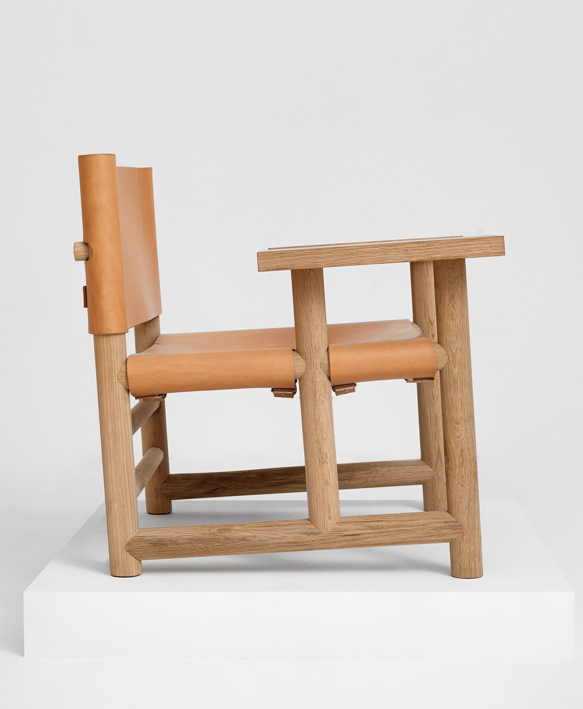Joacim Wahlström's contemporary hunting chair for Verk shown from multiple angles displaying its refined silhouette