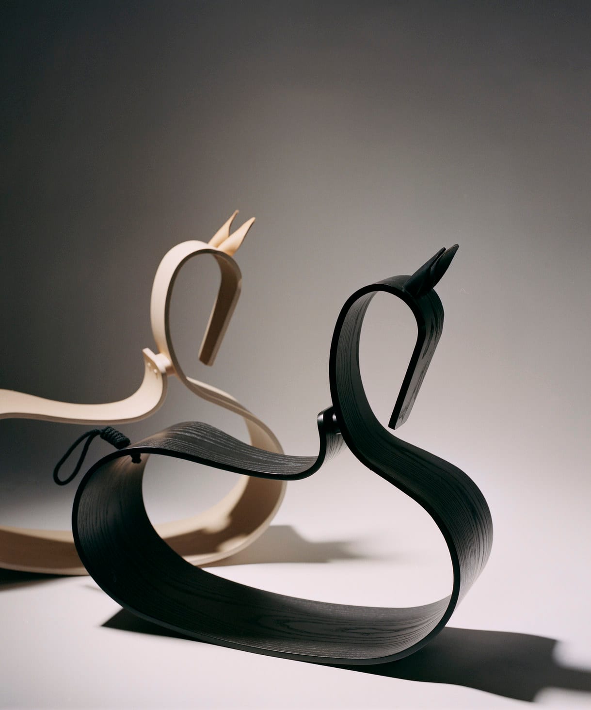 Fritz Hansen rocking horse with sculptural wooden form, showcasing Danish design heritage and craftsmanship.