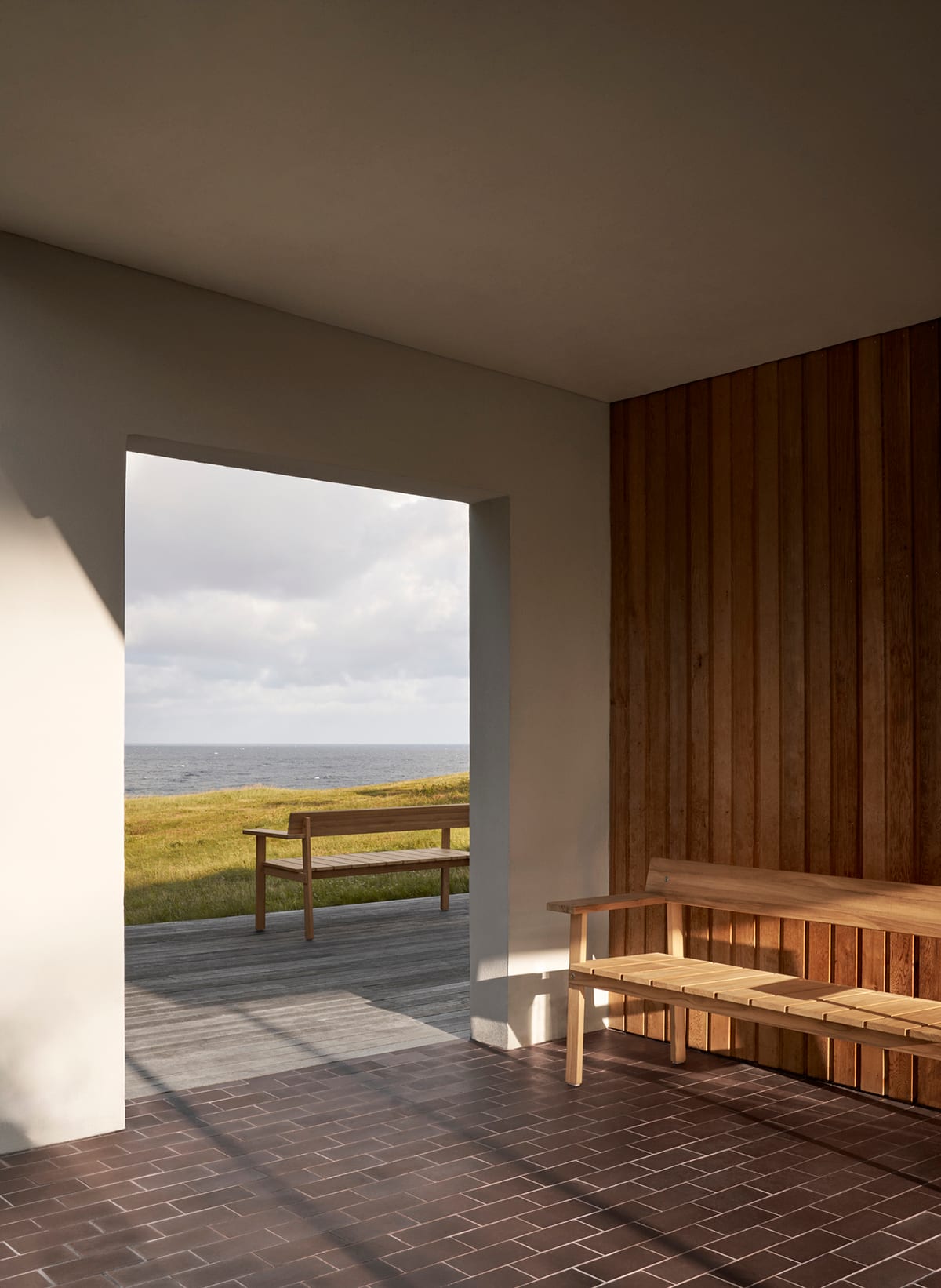 Timbur outdoor bench by Gudmundur Ludvik for Carl Hansen & Søn featuring clean Scandinavian lines with Icelandic design influence