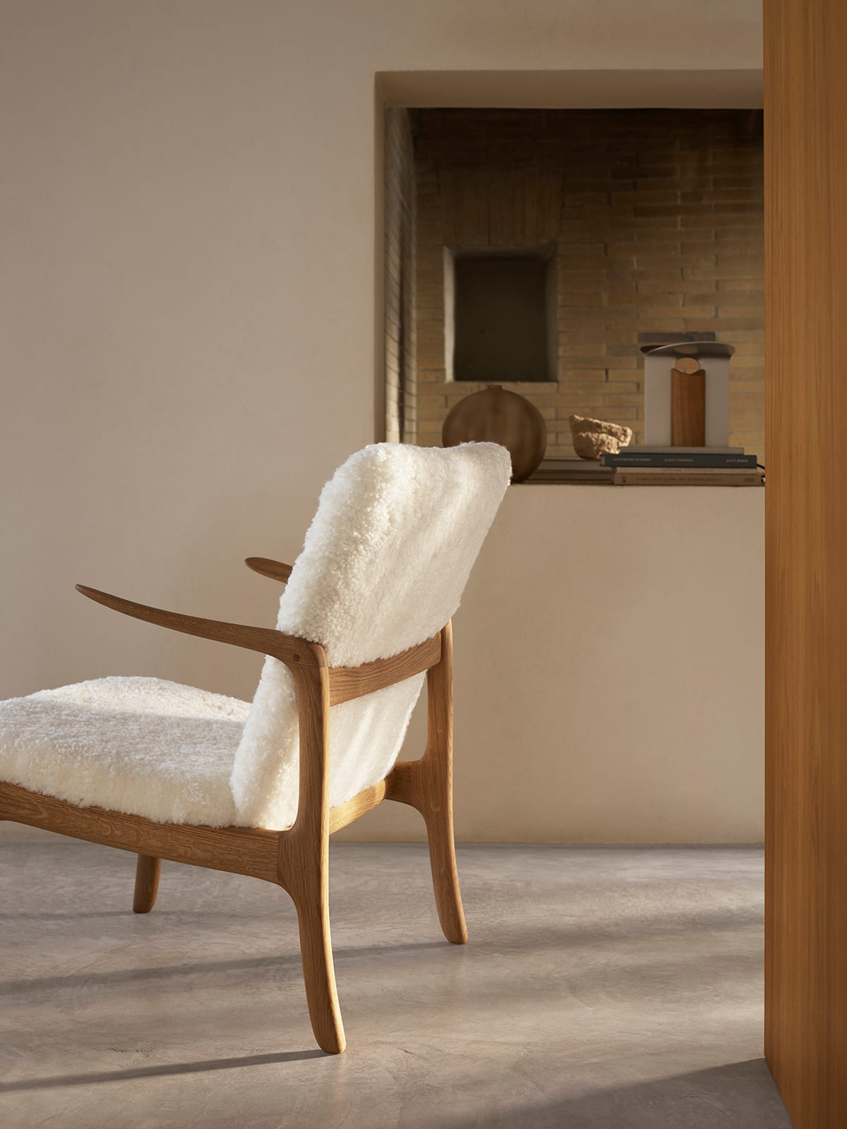 Beak Chair by Ole Wanscher for Carl Hansen & Søn with luxurious New Zealand lambskin upholstery and timeless Danish design