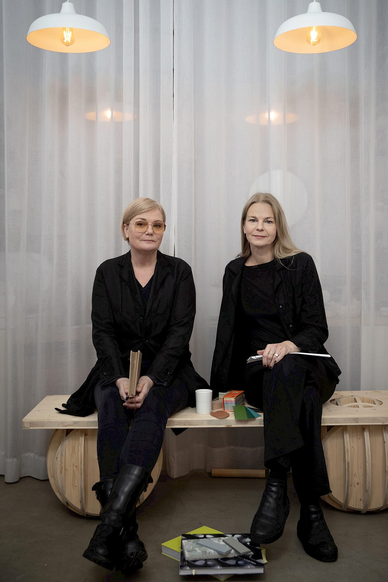 Nola's spatial exhibition stand at Stockholm Furniture Fair creating zones for relaxation and reflection amid trade show activity