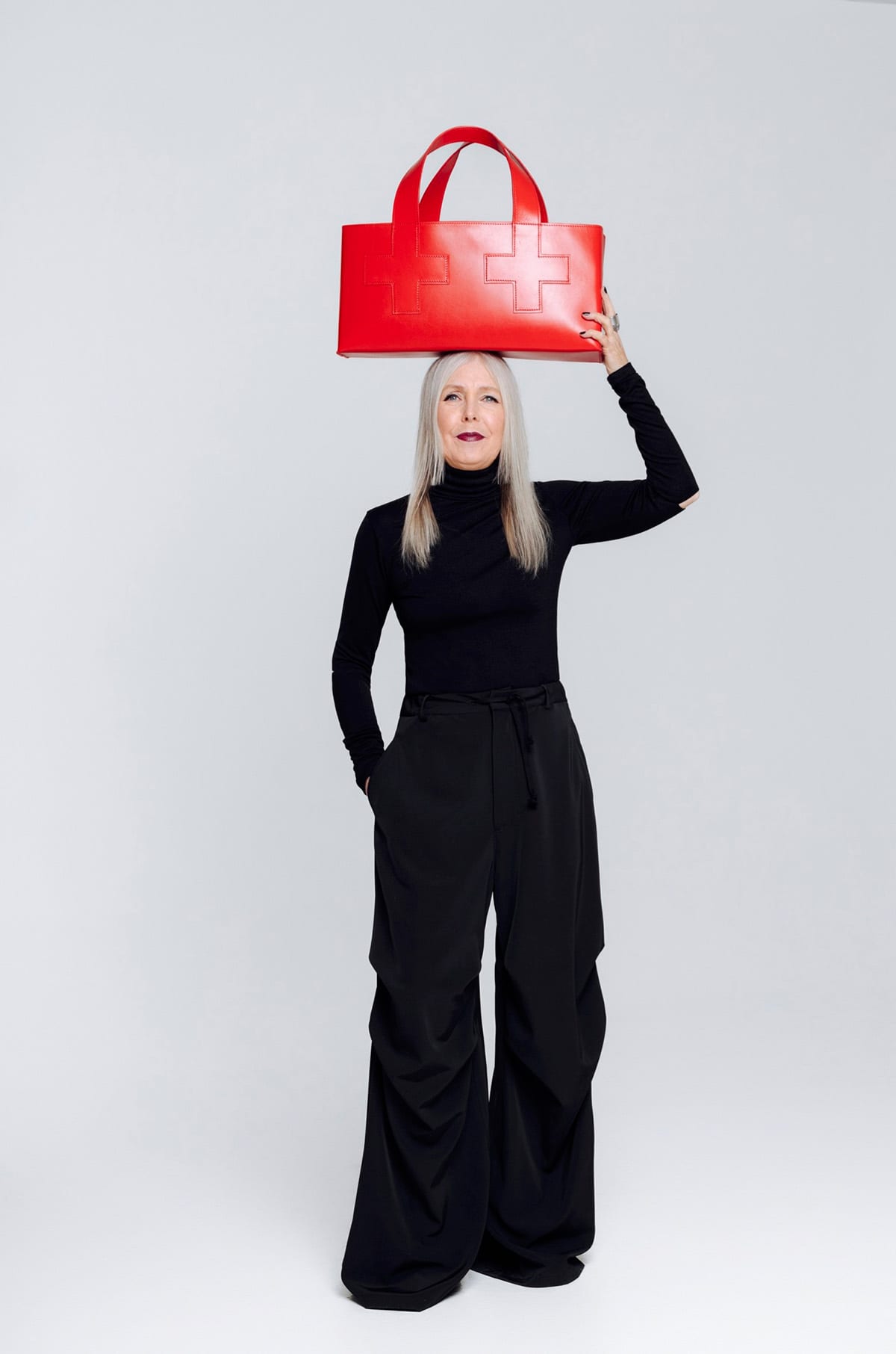 First Aid Bag by Pia Wallén for NK Tärnsjö Garveri collection in vegetable-tanned leather with distinctive cross symbol