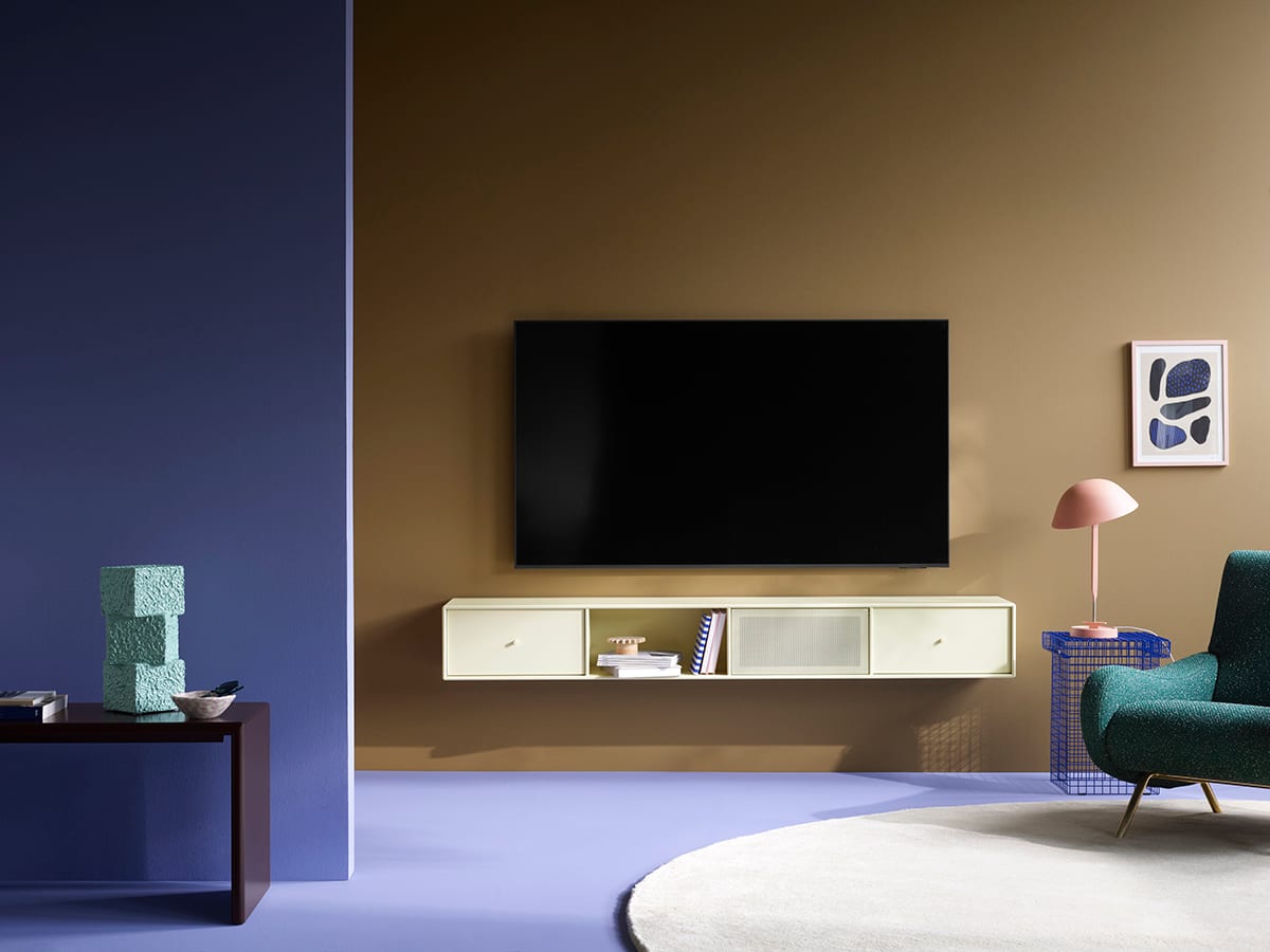 Functional TV furniture by Peter J. Lassen for Montana offering visual silence in contemporary interiors