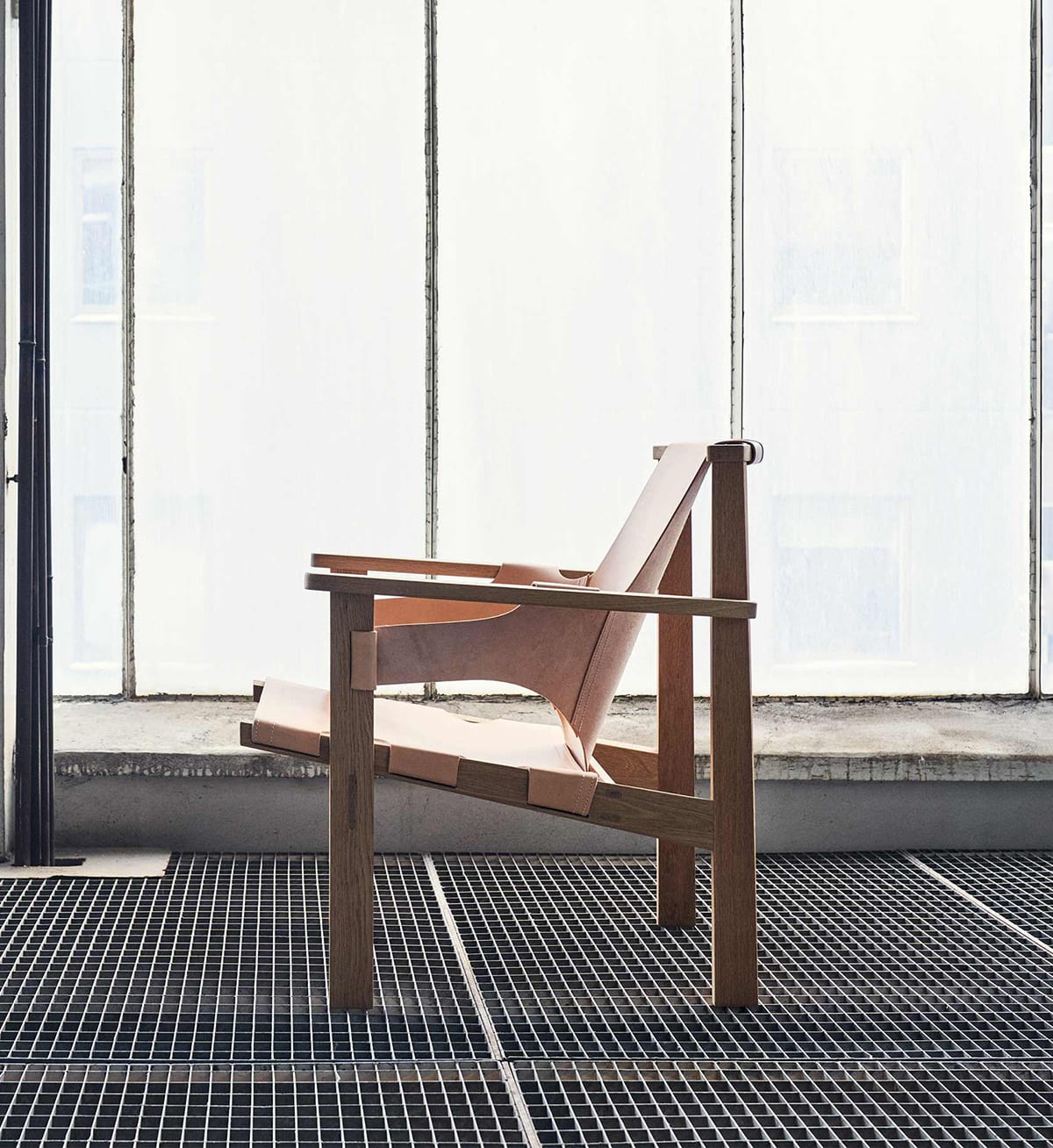 Historic Trienna armchair originally designed by Swedish architect Carl-Axel Acking reissued by Verk