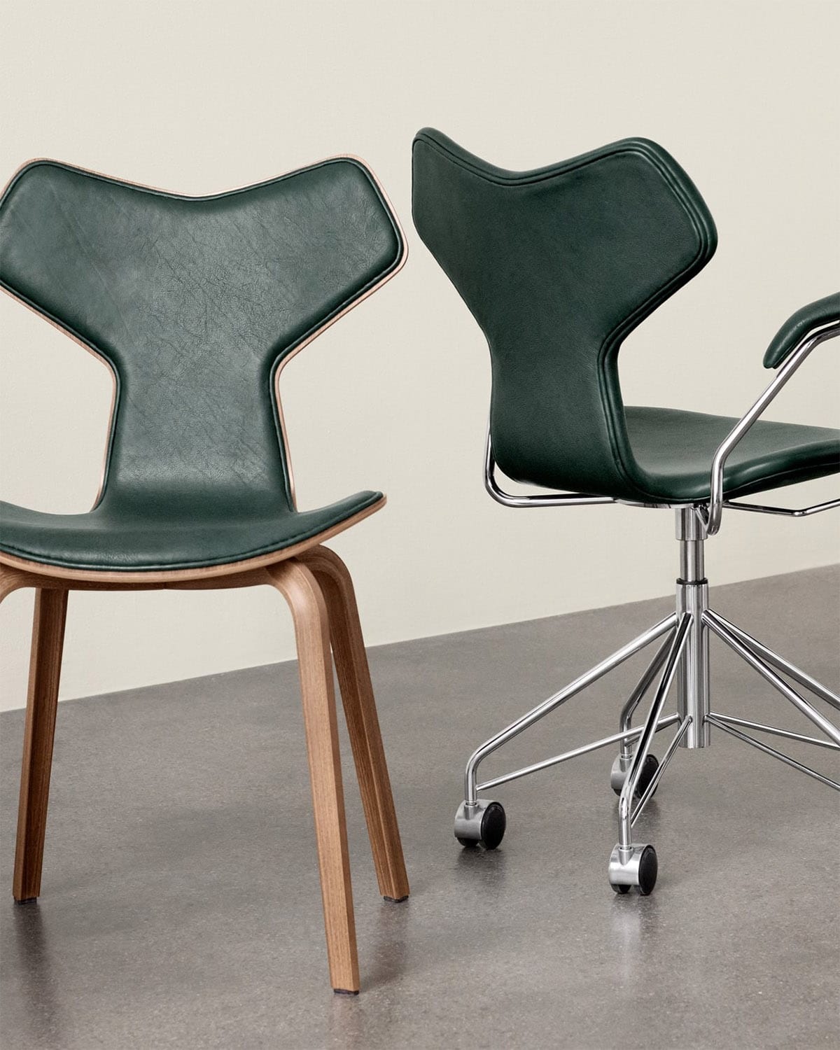 Limited edition Grand Prix Chair featuring luxurious green leather and walnut veneer