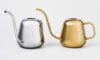 Elegant Nappula watering pot by Matti Klenell for Iittala with distinctive silhouette