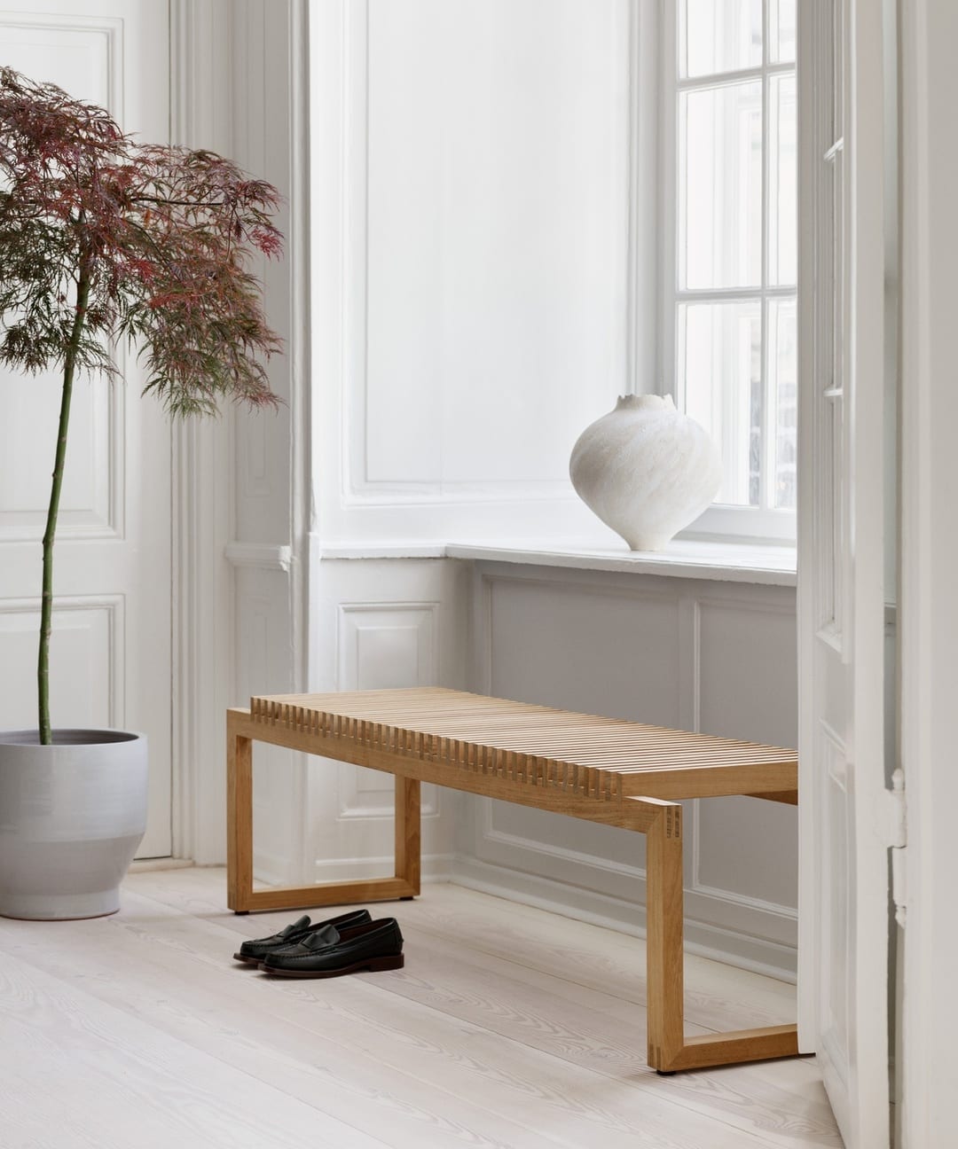 CUTTER bench by Niels Hvass for Fritz Hansen celebrating 25th anniversary of the iconic Danish design with enduring presence