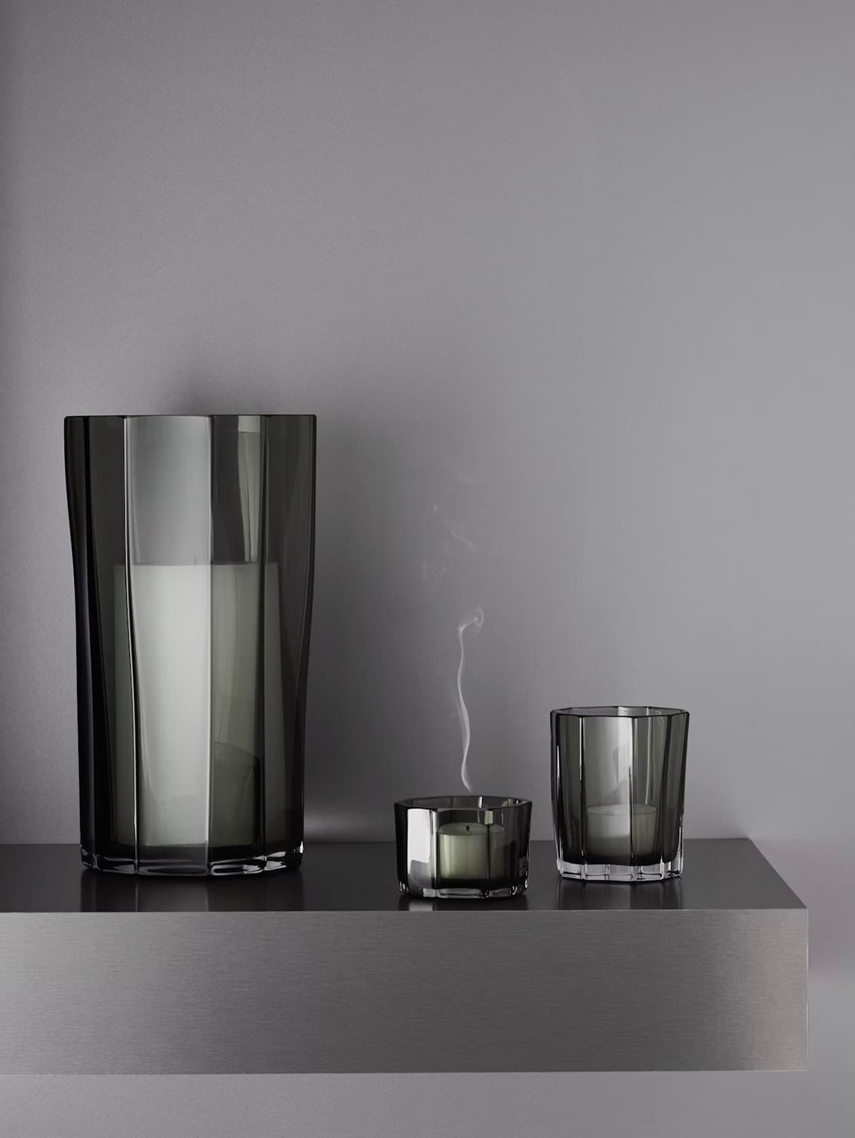 REED glass collection by Monica Förster for Orrefors featuring organic poetry through expanded range with vase, tealights, and storm lantern