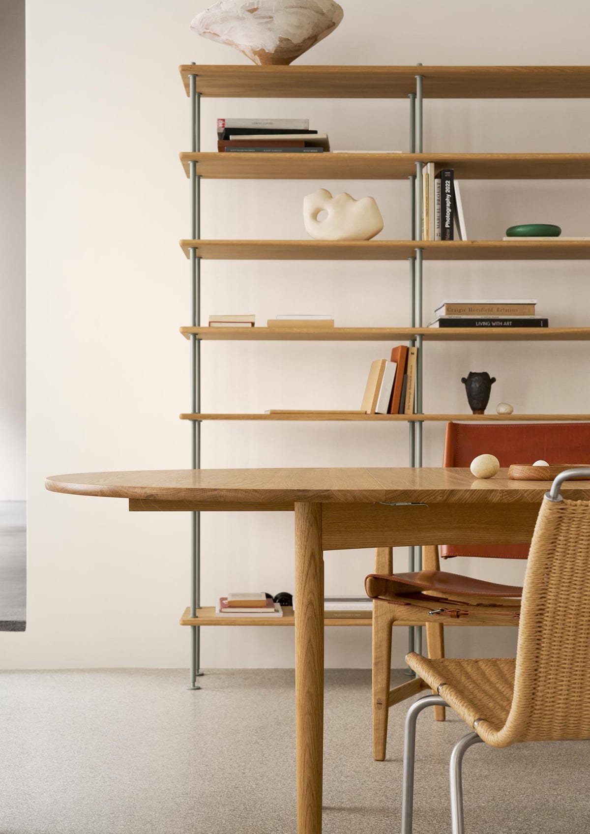 BM0121 coffee table with surrounding seating demonstrating its role as gathering point in contemporary living space