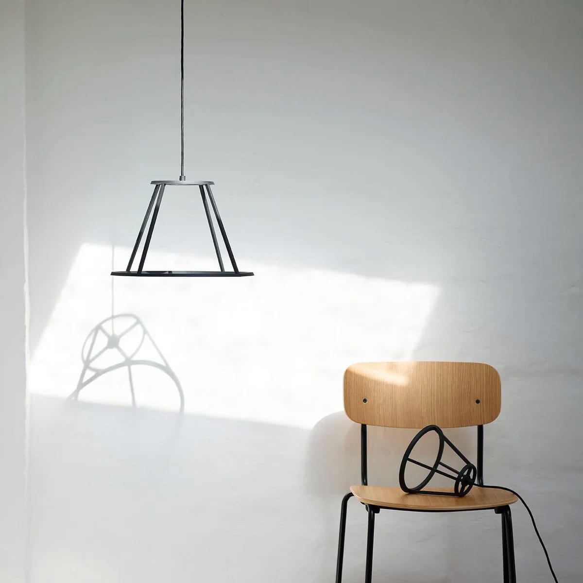 HISTORY pendant by Kasper Salto and Thomas Sigsgaard for FDB Møbler featuring design that references the brand's cooperative heritage