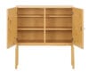 Artek's Cabinet 250 Celebration limited edition with honey-stained birch veneer and Tove Jansson's Moomin characters inside