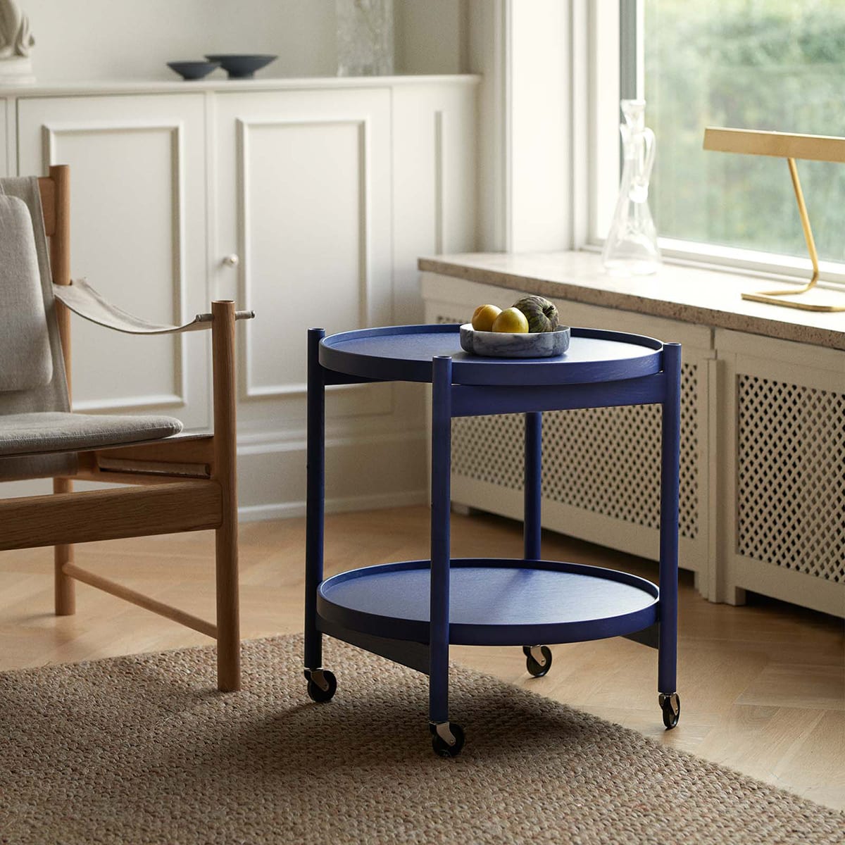 The indigo blue Tray Table designed by Hans Bølling