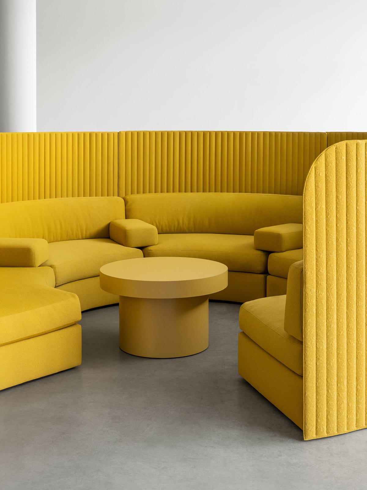 Focus Spaces modular sofa in open office setting, creating private meeting nooks within collaborative workspace