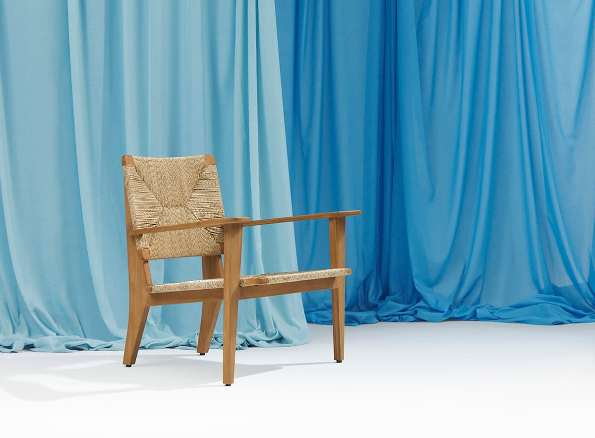 Side view of F-Chair Outdoor showing tapered rear legs and upright front legs characteristic of Gascoin's design