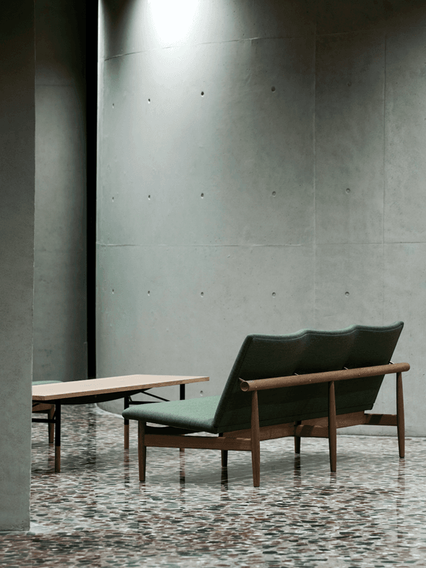Japan Series collection by Finn Juhl including lounge chair, sofa, and footstool showing design consistency across the 1957 line.