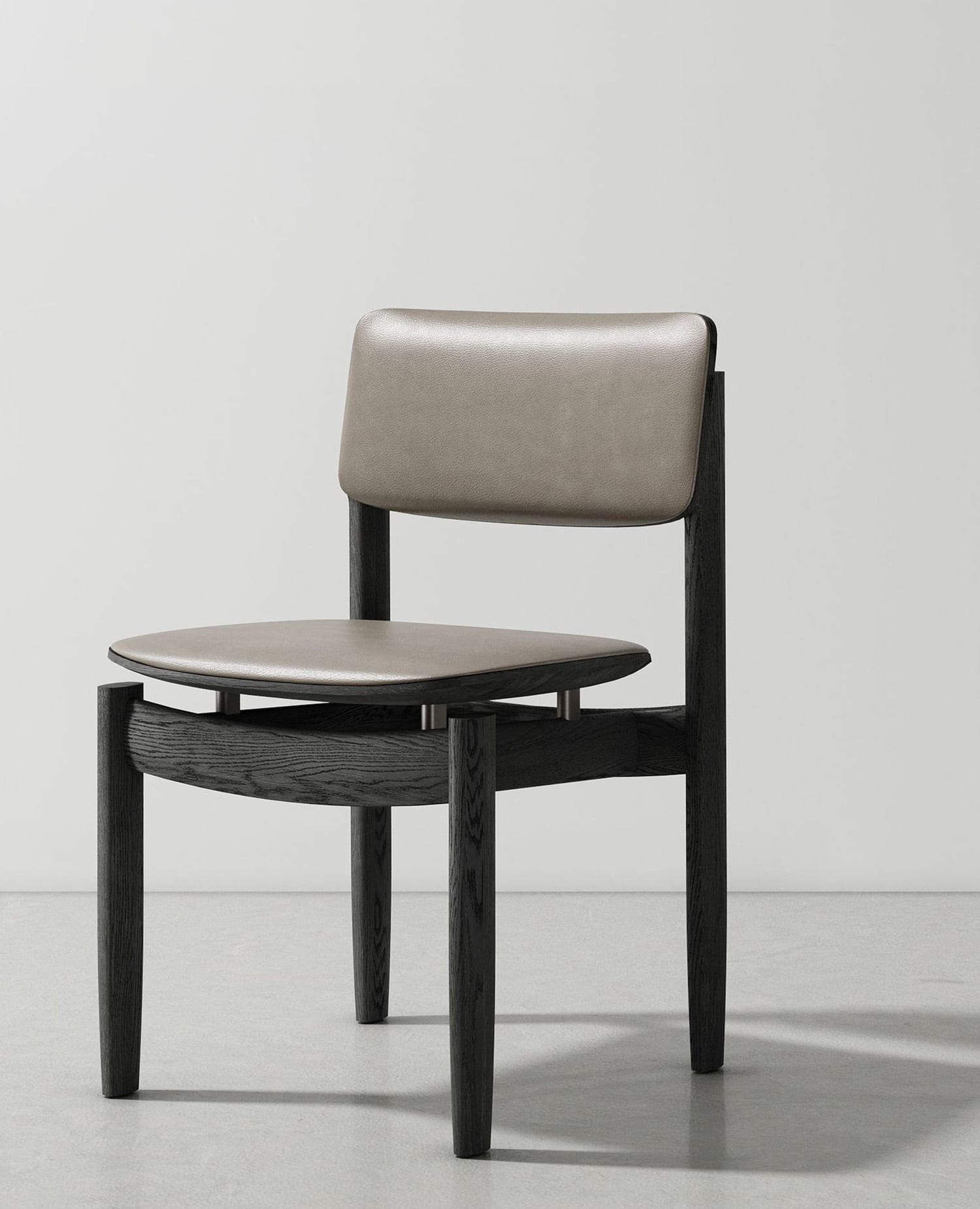 District Eight's Bow Chair highlighting the gravity-defying construction and ergonomic contours.