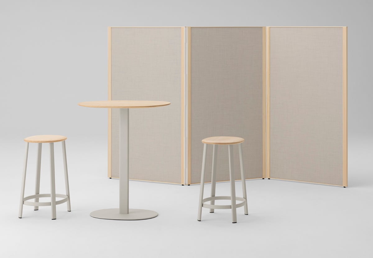Maku screen positioned against neutral backdrop showcasing its architectural form and material textures.
