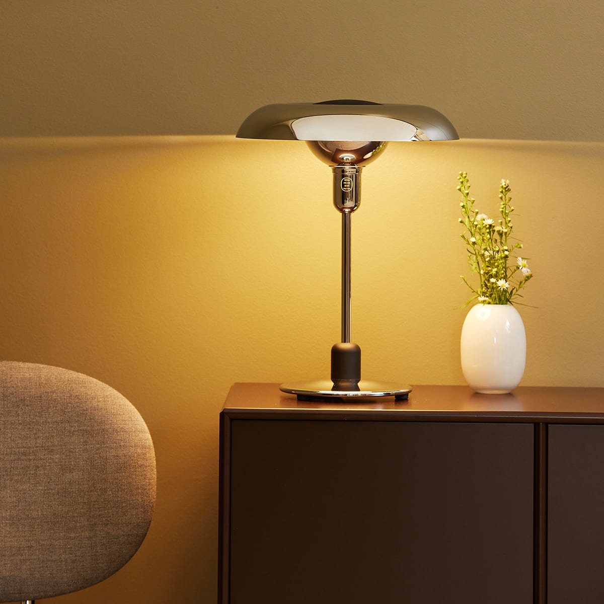 RA250 Anniversary chrome desk lamp illuminating modern workspace, showcasing optimal anti-dazzle lighting