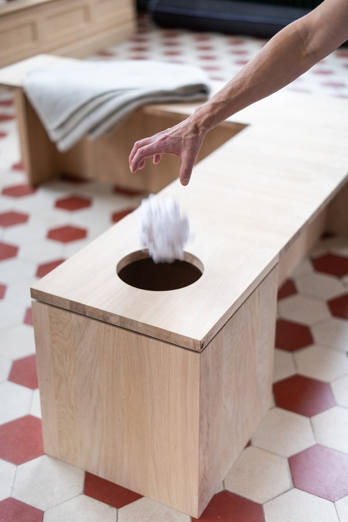 V.TB.01 seating collection arranged in public space showing modular configuration options and oak finish