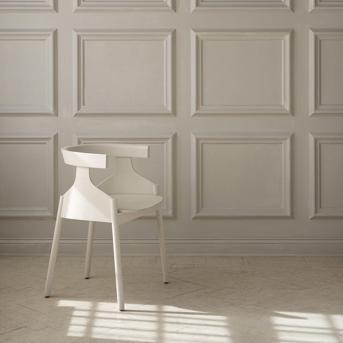 Howdoyoudo chair positioned in modern boardroom setting showcasing professional furniture application