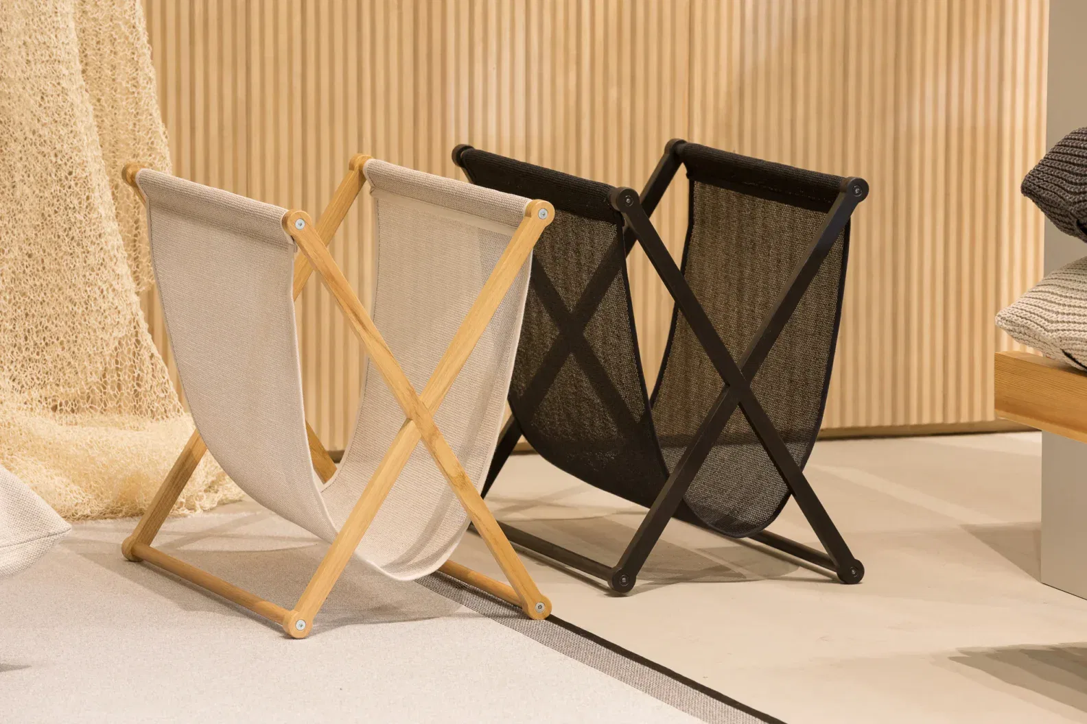Woodnotes Magazine Rack by Raffaella Mangiarotti and Ilkka Suppanen – oak frame with woven paper yarn bag