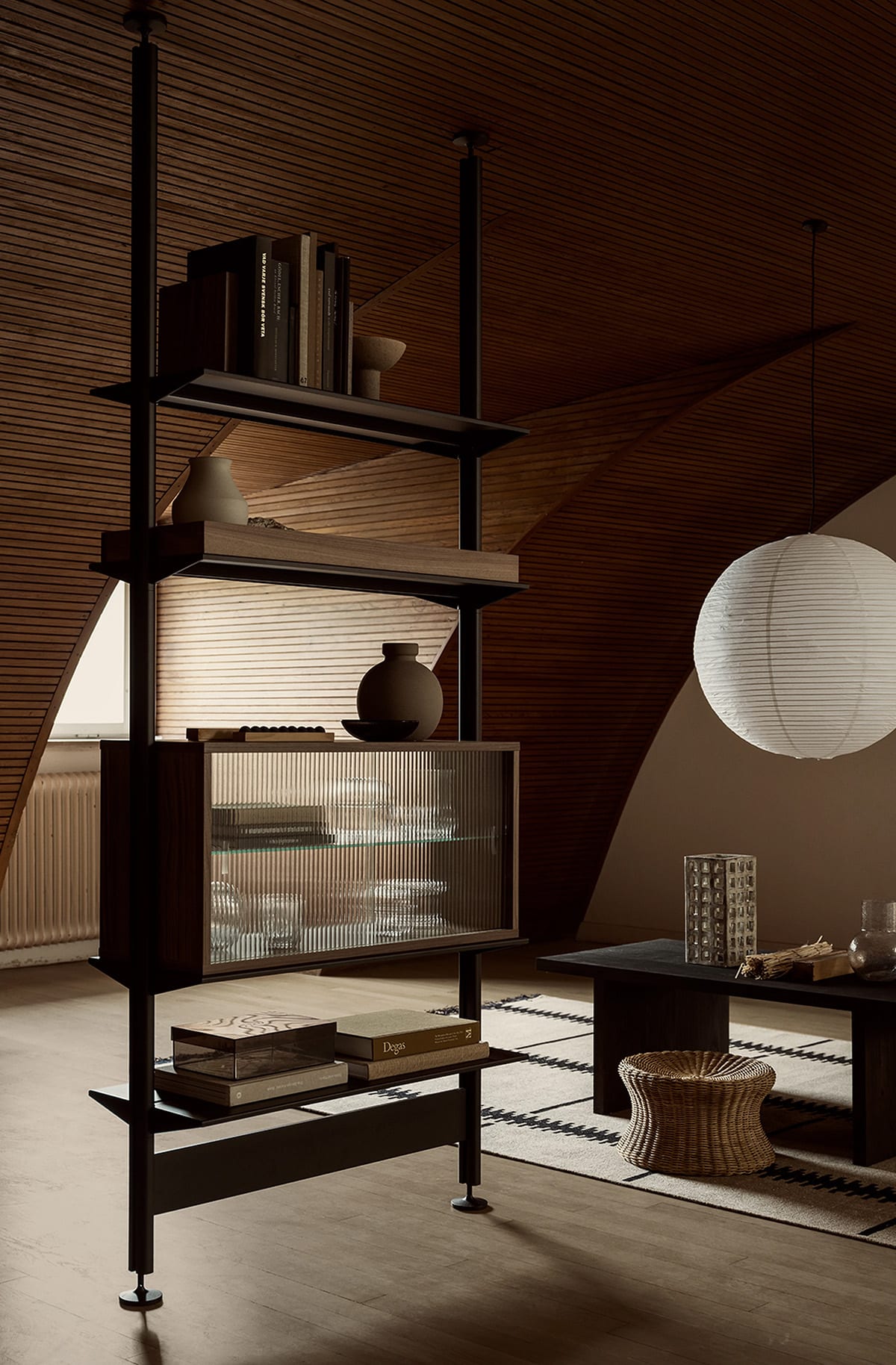Pira glass cabinet used as room divider, double-sided sliding doors, fluted glass version