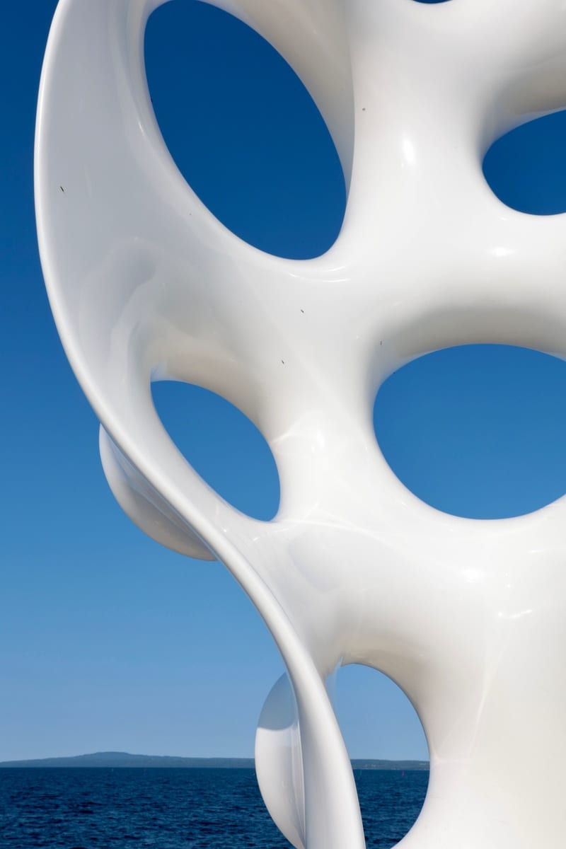 Detail of Eva Hild Hold sculpture matt white lacquered steel surface looping form