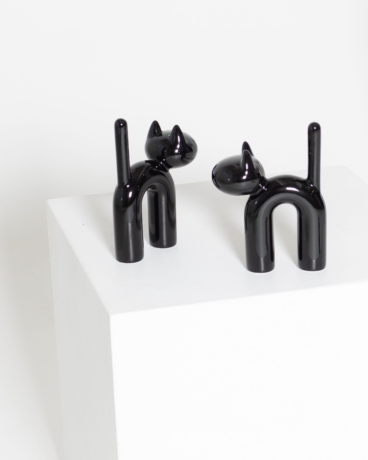 Shiny black finish detail of Mini KISU ceramic object by Eero Aarnio