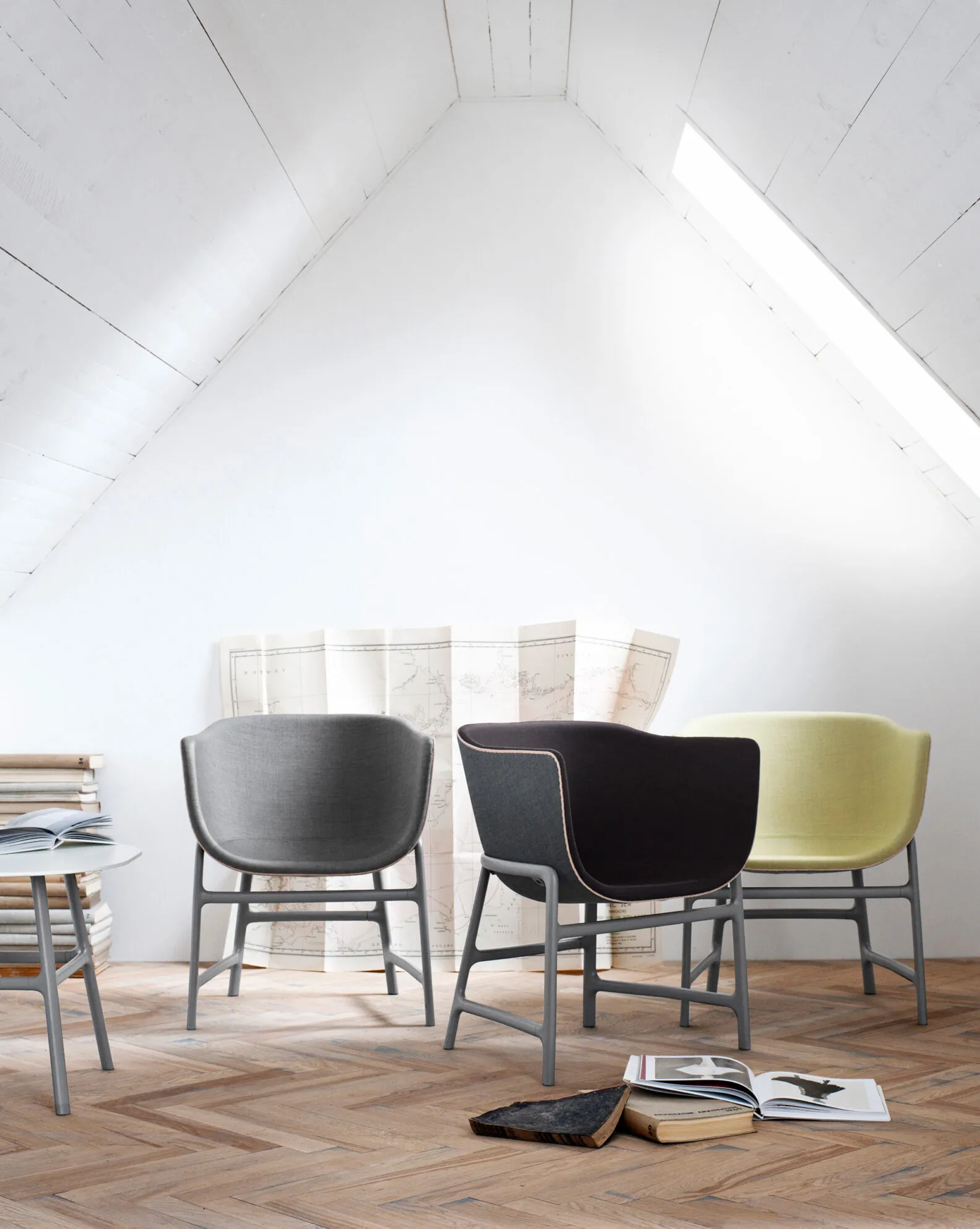 Minuscule lounge chair by Cecilie Manz for Fritz Hansen featuring minimalist Danish design with grey upholstery