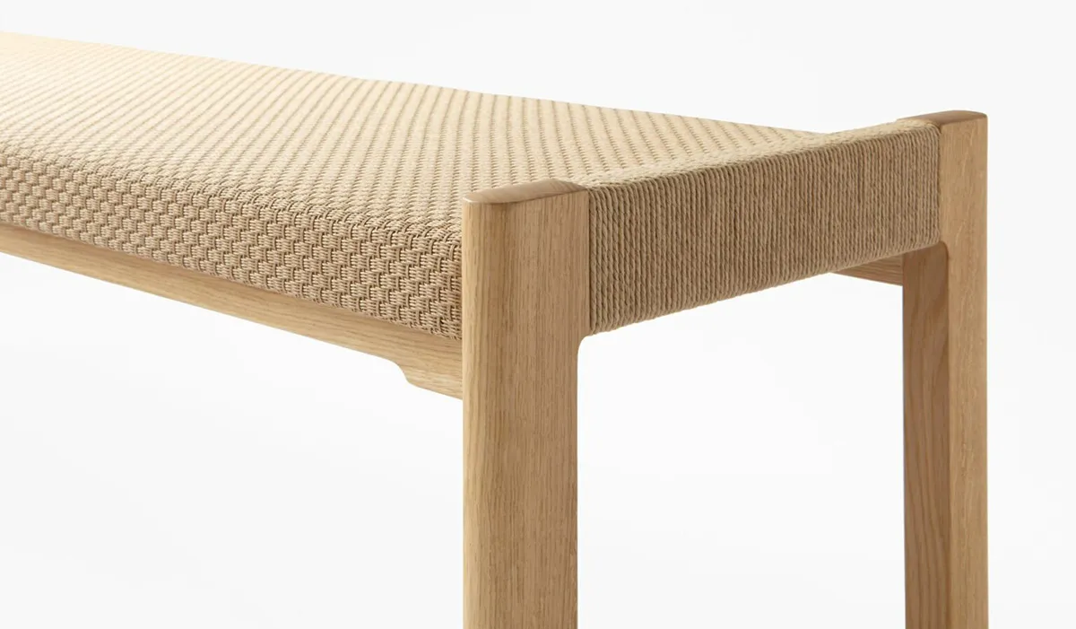 Detail view of Detalji bench's traditional joinery and Woodpecker paper yarn fabric by Ritva Puotila