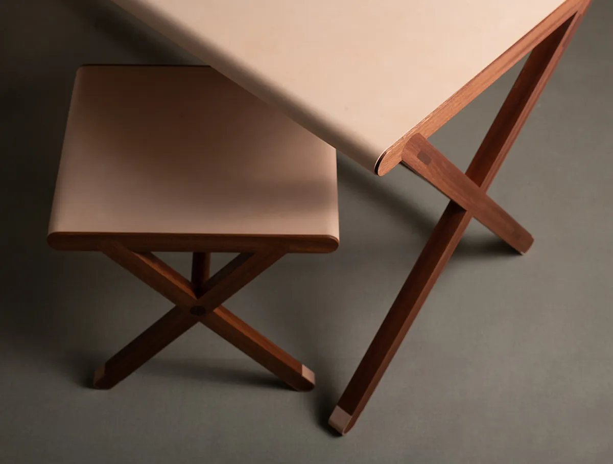 Thomas Sandell Cross Table Kryssbordet by Palmgrens crafted from sipo mahogany with vegetable-tanned leather