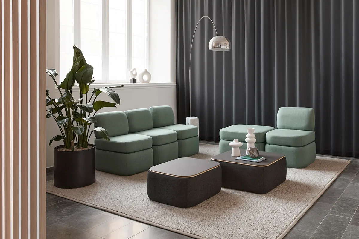 Charlie modular sofa system with signature metal ring by Färg & Blanche for Johanson Design
