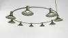 Compose perforated metal pendant creating atmospheric light patterns by Jens Fager for Zero