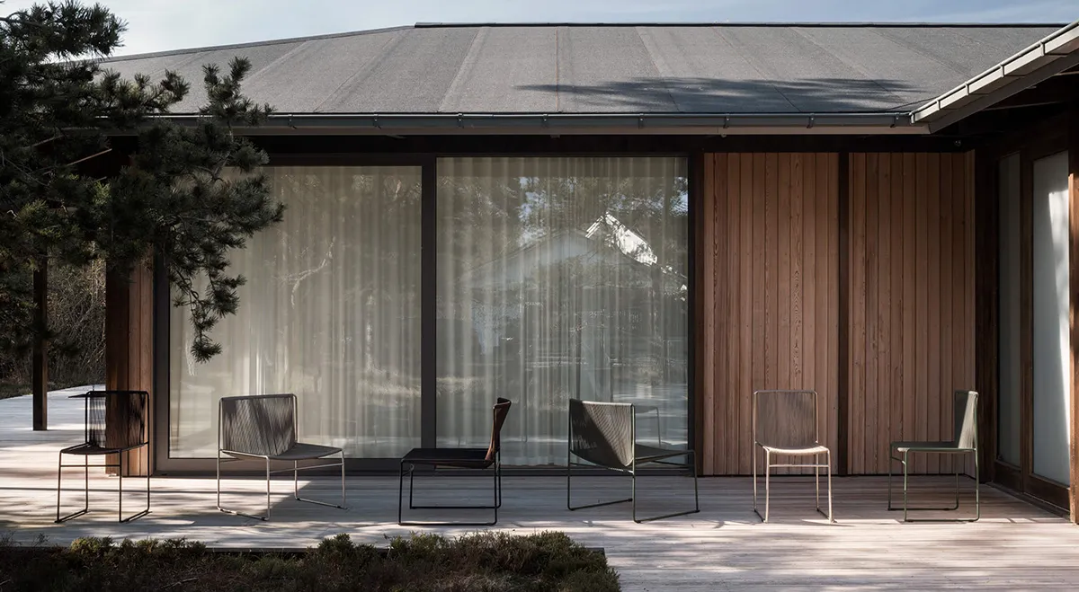 LYRE chair outdoor setting demonstrating weather resistance and indoor outdoor versatility Pierre Sindre design