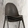 ETERNITY stackable chair by Space Copenhagen for Mater made from 70% plastic waste and 30% coffee shell waste