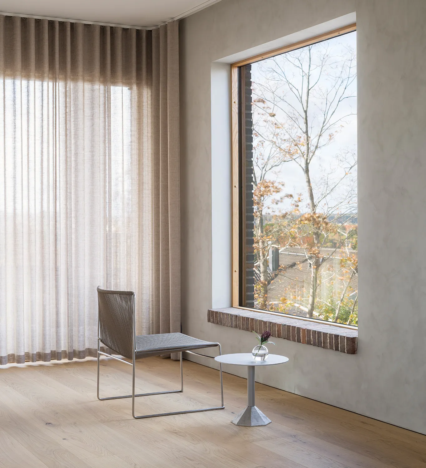 LYRE lounge chair by Pierre Sindre for Bebo Objects featuring stainless steel frame with olefin string weaving