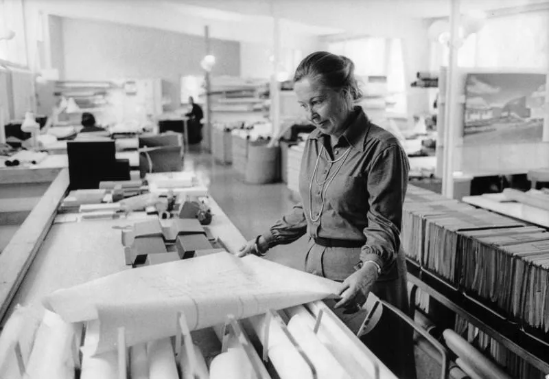 Architect Elissa Aalto photographed during construction supervision at Finnish modernist building site